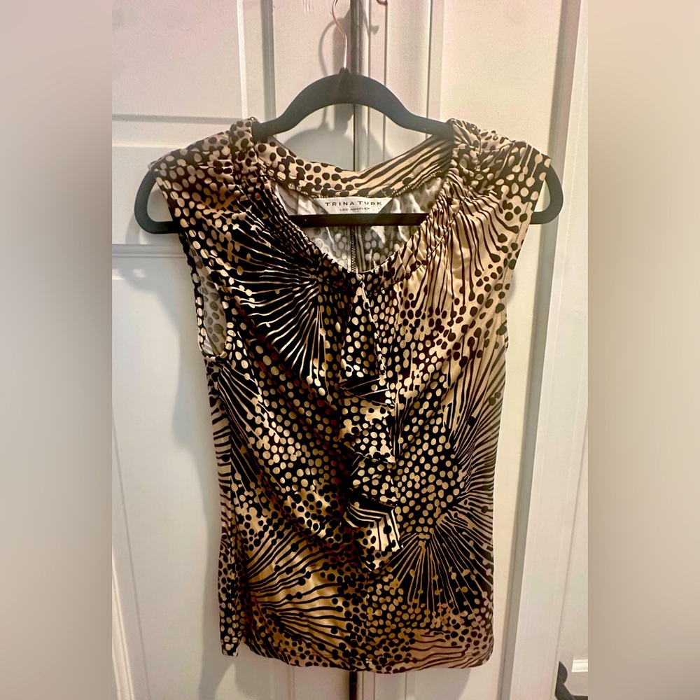 Trina Turk small sleeveless blouse with front ruffle